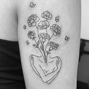 Tatouage minimaliste foral